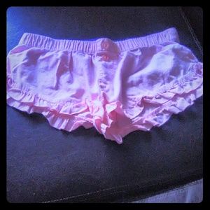 Top model pink shorts.